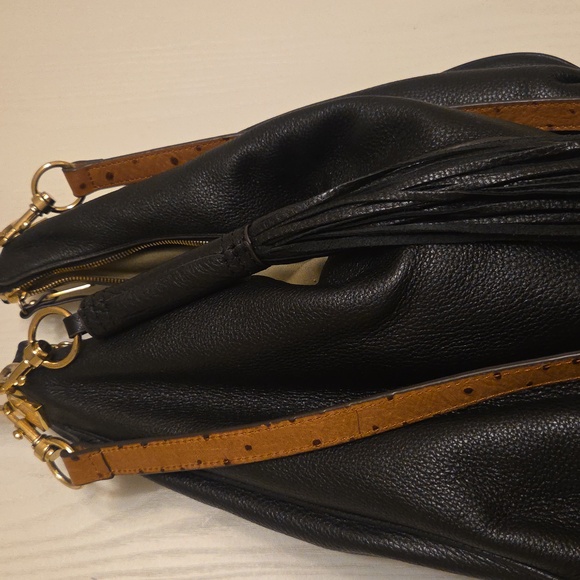Elegant GILI Black Leather Hobo Bag with Ostrich trim.
